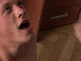 Young and attractive Caucasian men receiving semen from oral sex