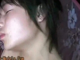 Asian boys in bondage receive a manual stimulation