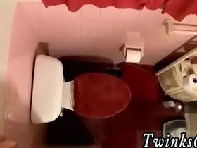 Gay solo video features brown-haired Asia boy in a room full of pissing dicks