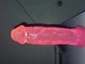 A big pink dildo for gay anal play