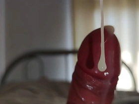 Asian boy's cock stands at attention