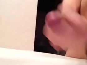 Asian gay guy masturbates for orgasm